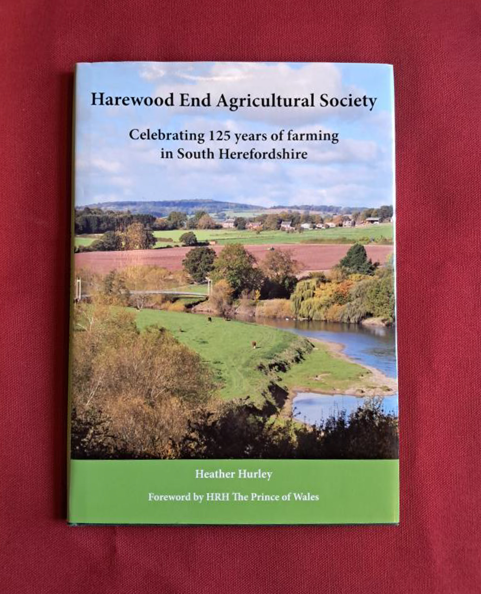 Harewood End Agricultural Society. Photograph of the countryside covers the front page, with a bright green banner across the bottom.