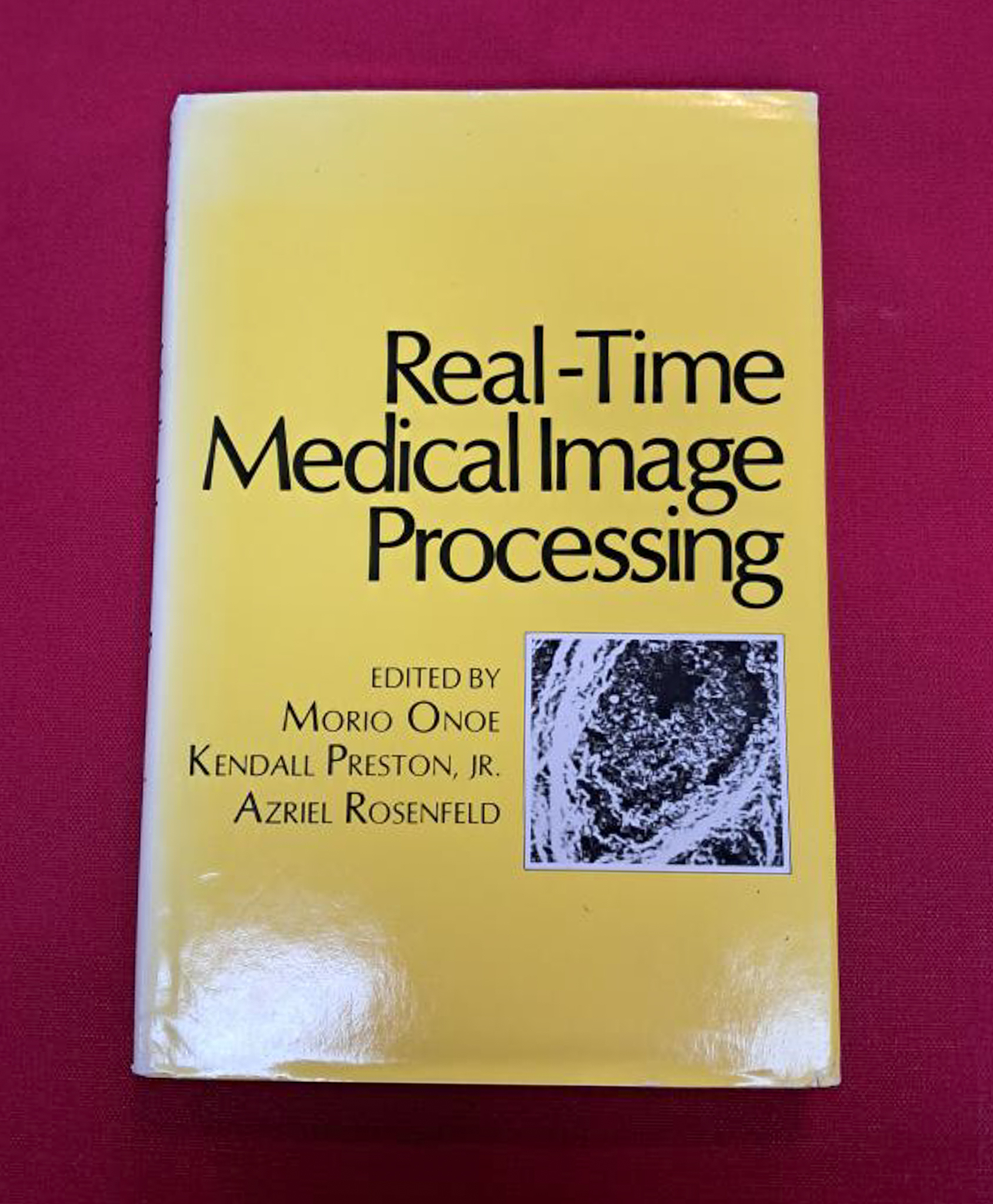 Real-time medical image processing. Bright yellow cover with black text and a small black and white square image