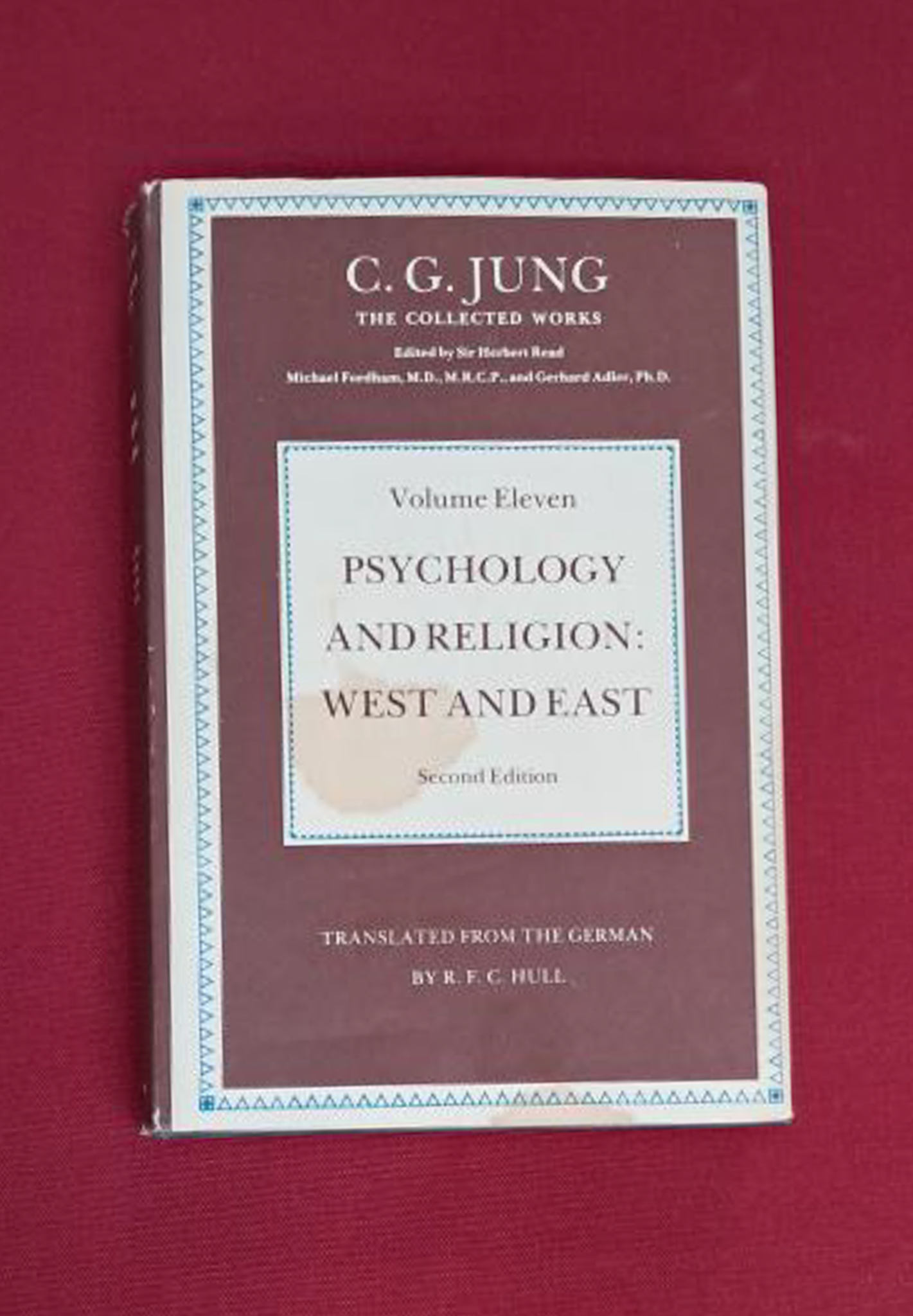 Psychology and Religion. Dark maroon cover with off white text boxes